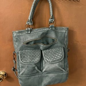 Maurice’s blue purse